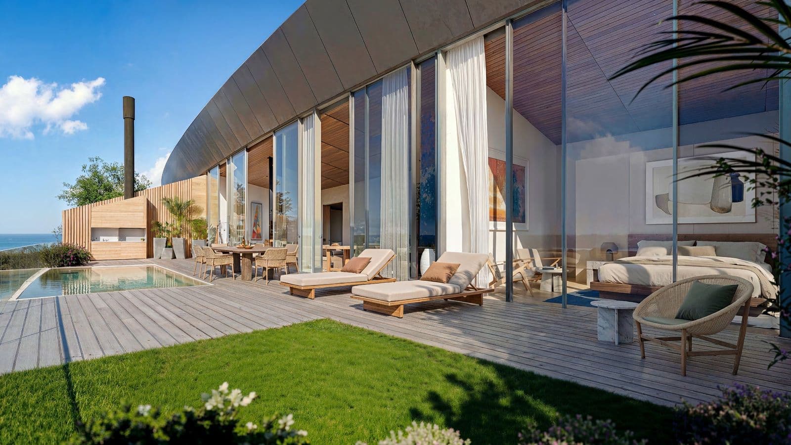 A penthouse bedroom opening onto a private pool terrace